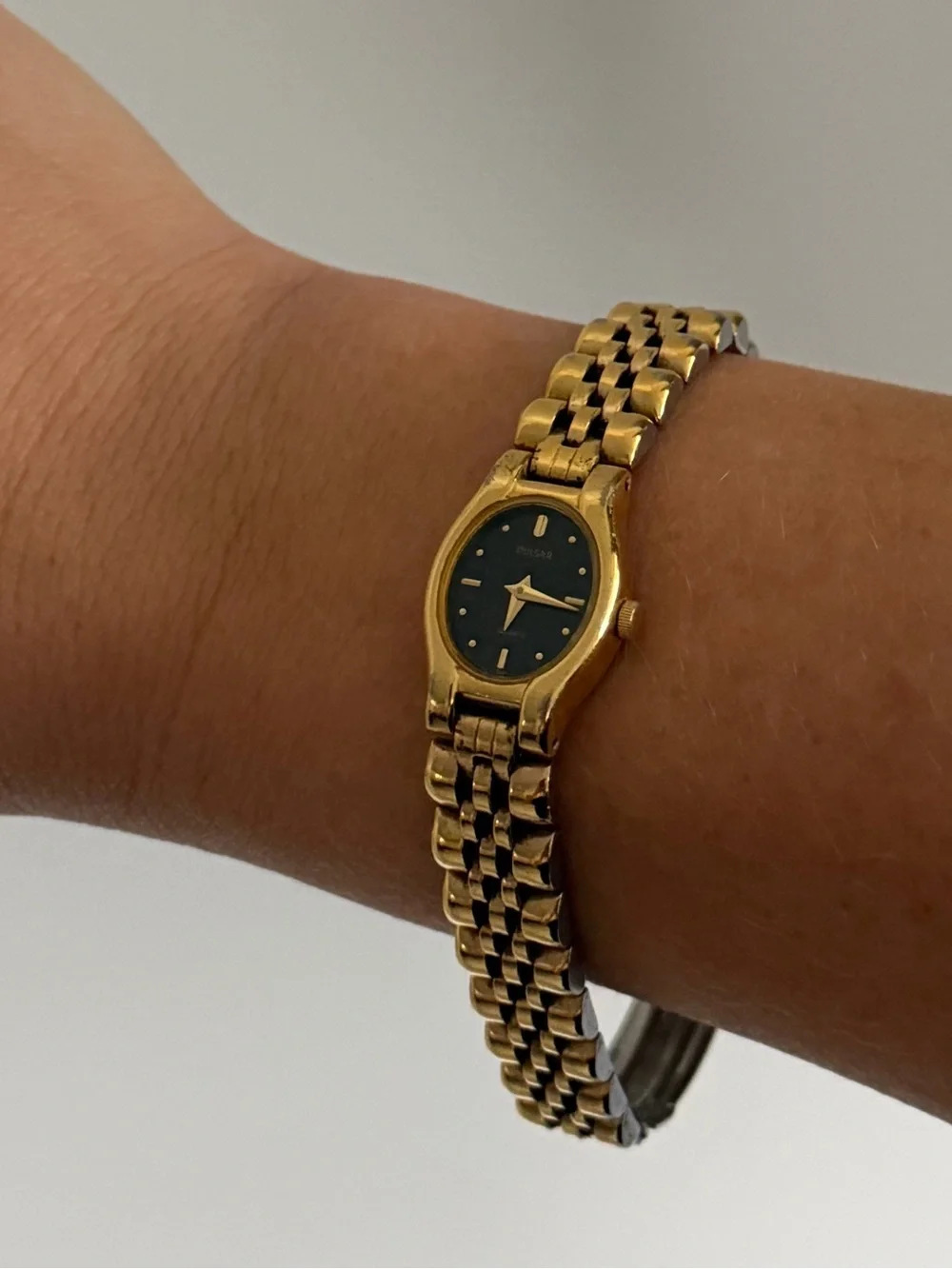 Vintage Pulsar Gold-Tone Watch with Black Dial